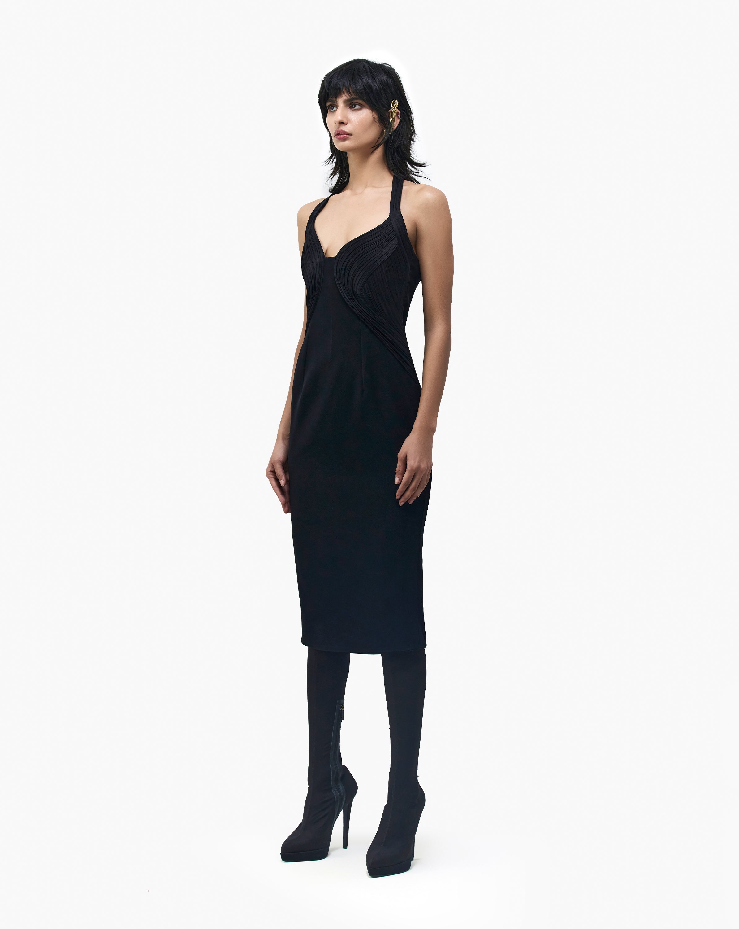 Woman wearing black long dress by Gaurav Gupta
