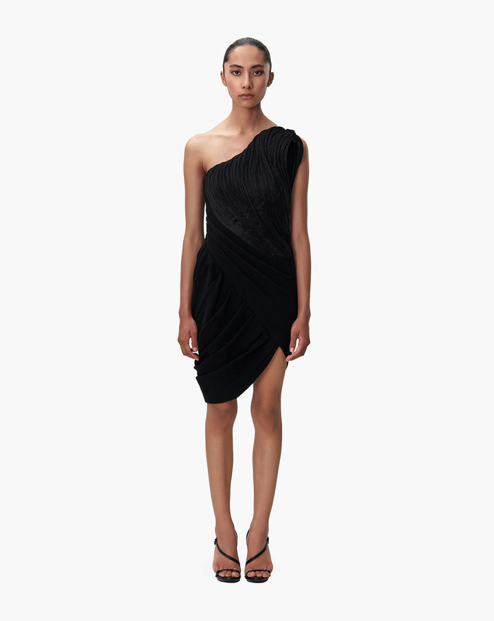 Model wearing black dress by Gaurav Gupta