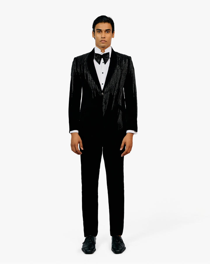 Model wearing black suit set by Gaurav Gupta