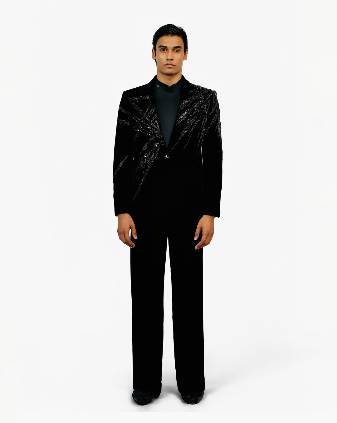 Man in black embroidered set suit by Gaurav Gupta