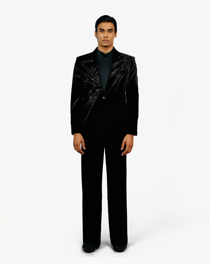 Man in black embroidered set suit by Gaurav Gupta