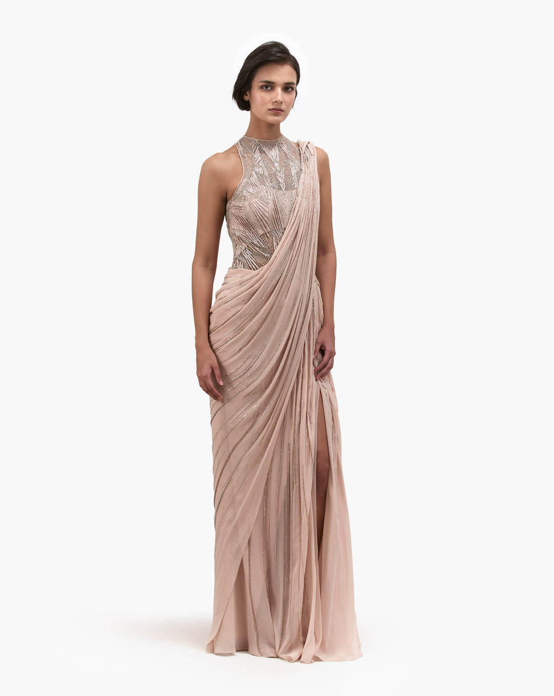 Women wearing white pearl gown by gaurav gupta